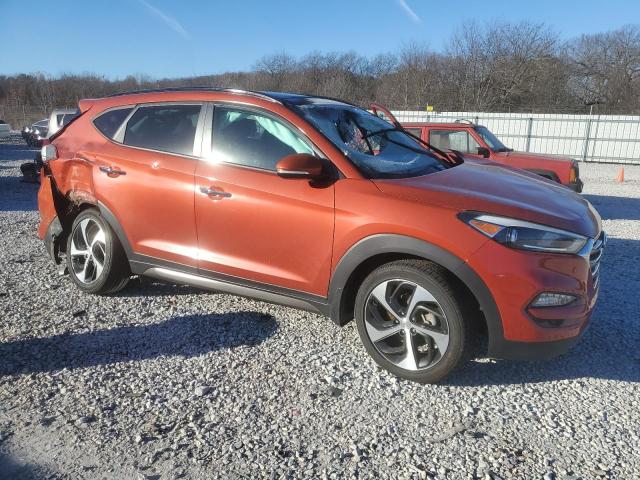 KM8J33A27GU094552 - 2016 HYUNDAI TUCSON LIMITED ORANGE photo 4