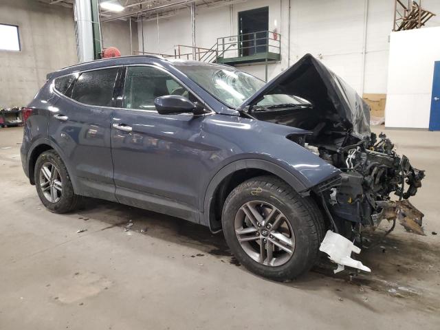 5NMZUDLB9HH009498 - 2017 HYUNDAI SANTA FE S BLUE photo 4