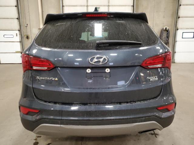 5NMZUDLB9HH009498 - 2017 HYUNDAI SANTA FE S BLUE photo 6