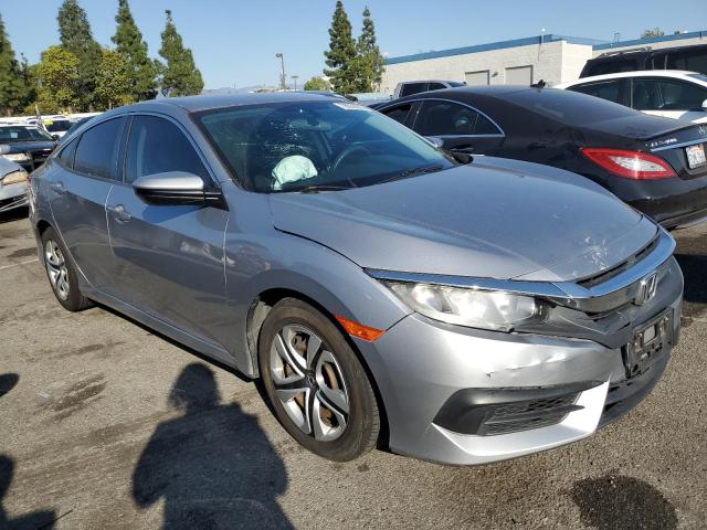 2HGFC2F52JH561945 - 2018 HONDA CIVIC LX SILVER photo 4