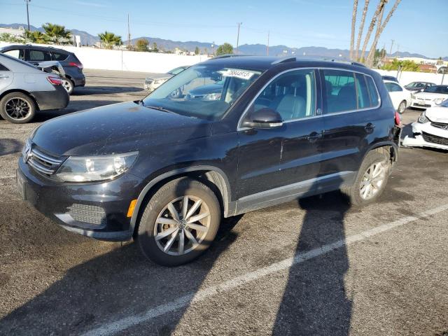 WVGRV7AXXHK013931 - 2017 VOLKSWAGEN TIGUAN WOLFSBURG BLACK photo 1