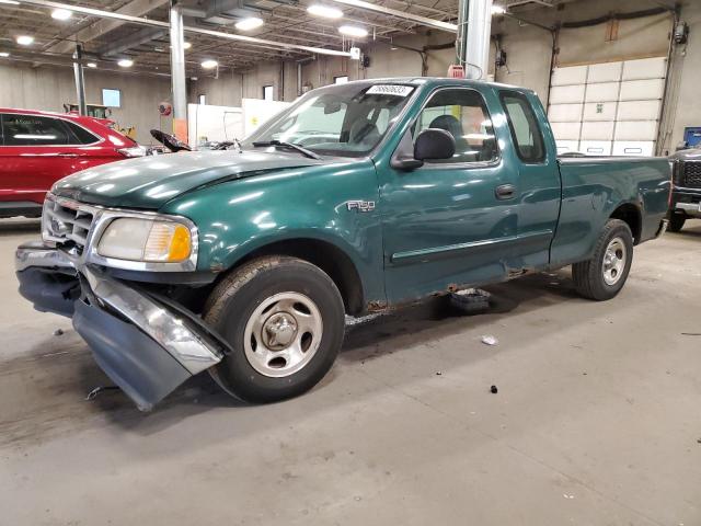 2FTZX1726XCA02726 - 1999 FORD F150 GREEN photo 1