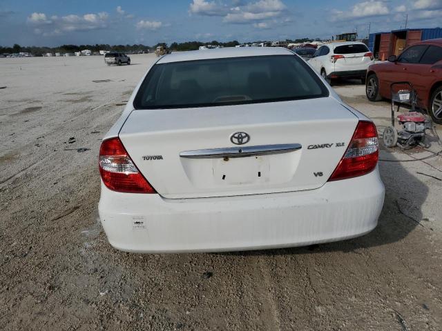 4T1BF30K94U082007 - 2004 TOYOTA CAMRY LE WHITE photo 6