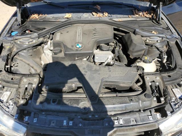 WBA8A9C50JAD27781 - 2018 BMW 320 I BLACK photo 11