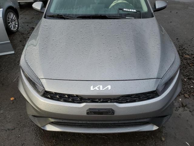 3KPF24AD3PE653128 - 2023 KIA FORTE LX GRAY photo 11