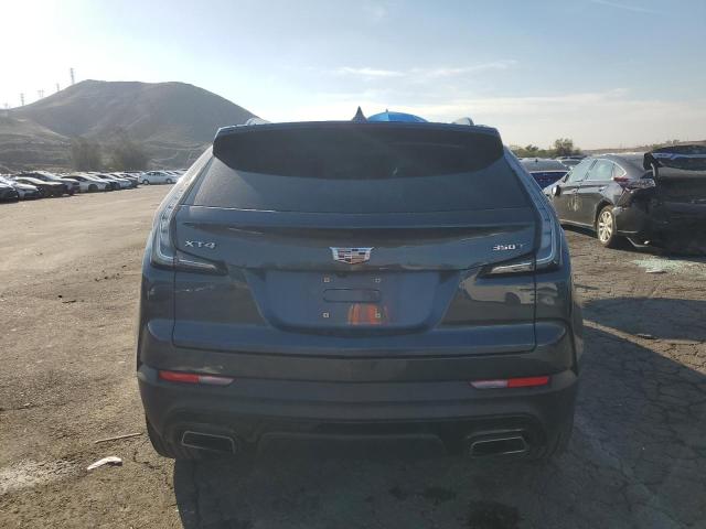 1GYFZER45MF079102 - 2021 CADILLAC XT4 SPORT BLUE photo 6