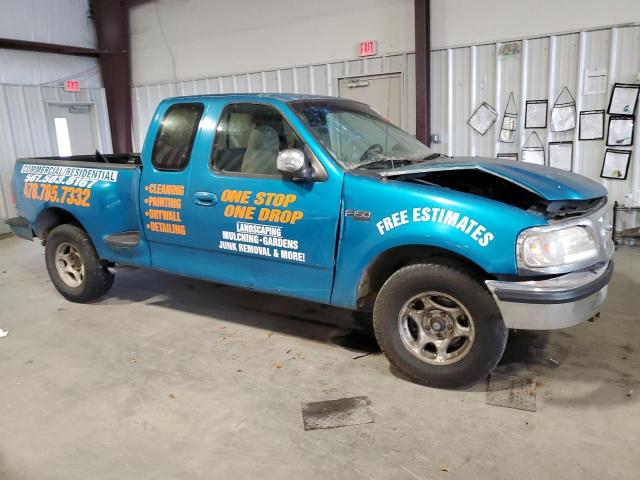 1FTDX0727VKC04875 - 1997 FORD F150 TEAL photo 4