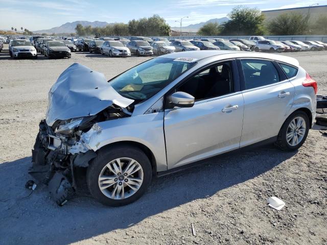 1FAHP3M23CL374879 - 2012 FORD FOCUS SEL SILVER photo 1