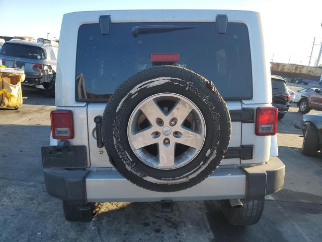 1J4HA5H10BL617775 - 2011 JEEP WRANGLER U SAHARA SILVER photo 6