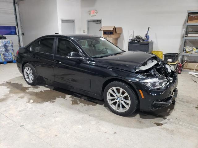 WBA8E1G59JNU91312 - 2018 BMW 320 I BLACK photo 4