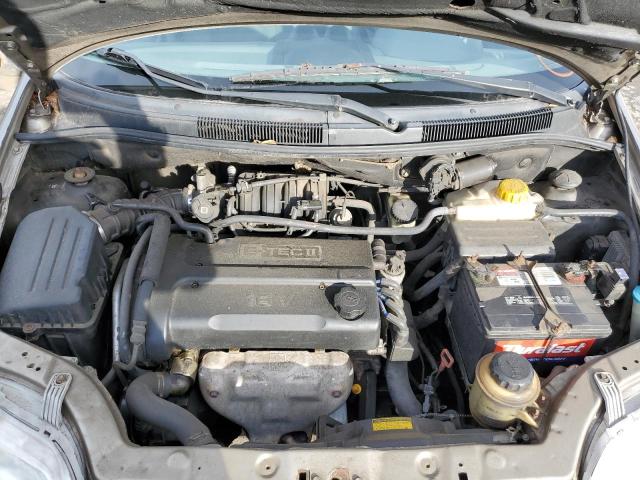 KL1TD52655B483357 - 2005 CHEVROLET AVEO BASE ოქროსფერი ფოტო 11