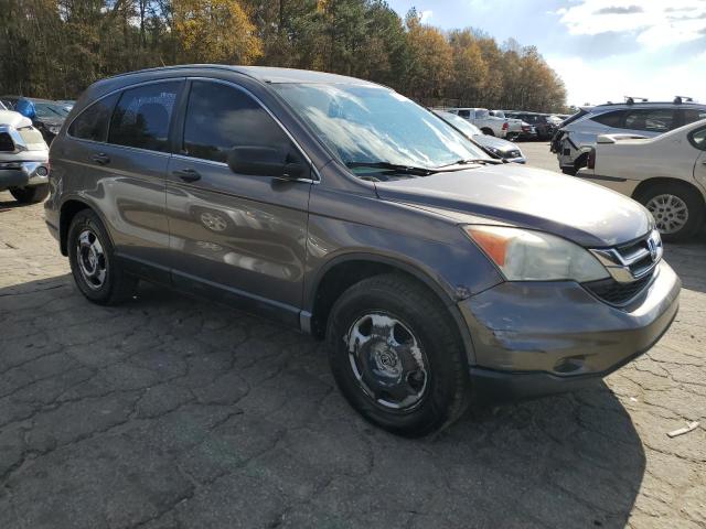 3CZRE3H38AG700462 - 2010 HONDA CR-V LX TAN photo 4