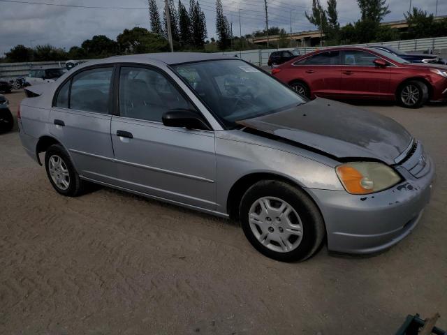 2HGES16511H579300 - 2001 HONDA CIVIC LX SILVER photo 4