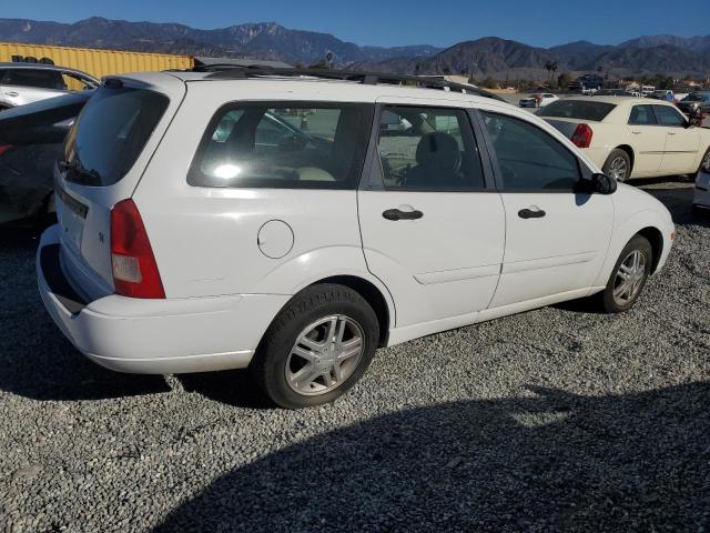 1FAFP3637YW423617 - 2000 FORD FOCUS SE WHITE photo 3