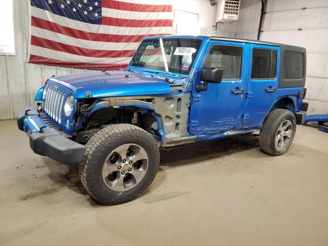 1C4BJWEG1GL172108 - 2016 JEEP WRANGLER U SAHARA BLUE photo 1
