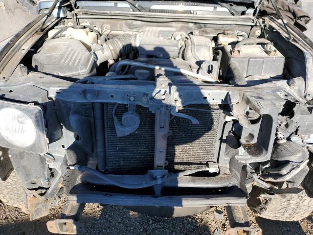 5GTDN136168199491 - 2006 HUMMER H3 GREEN photo 12