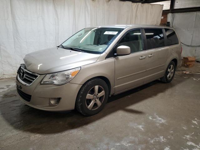 2V8HW34109R544866 - 2009 VOLKSWAGEN ROUTAN SE BEIGE photo 1