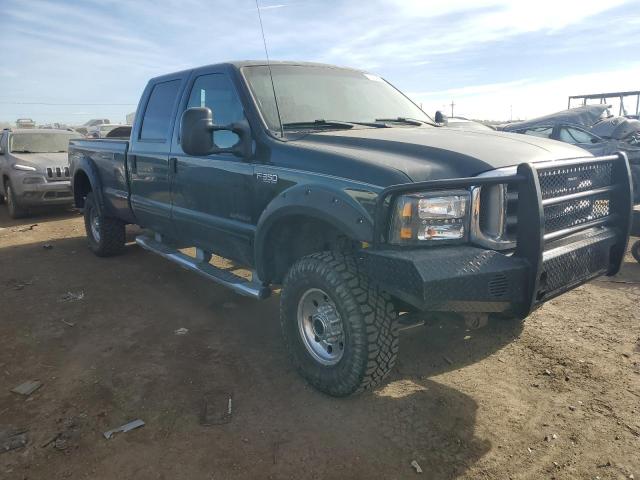 1FTSW31F31EB48532 - 2001 FORD F350 SRW SUPER DUTY GREEN photo 4