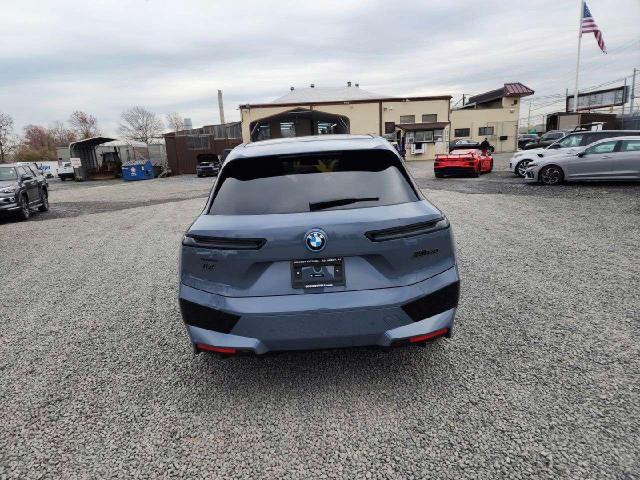 WB533CF08RCR13397 - 2024 BMW IX M60 BLUE photo 6
