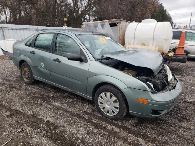 1FAFP34N65W124345 - 2005 FORD FOCUS ZX4 TEAL photo 4