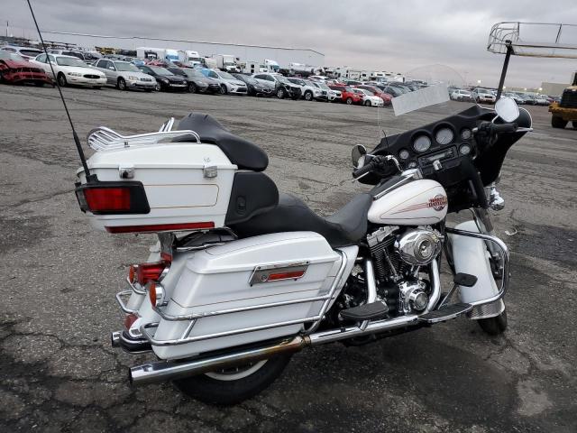 1HD1FC4177Y625402 - 2007 HARLEY-DAVIDSON FLHTCUI WHITE photo 4