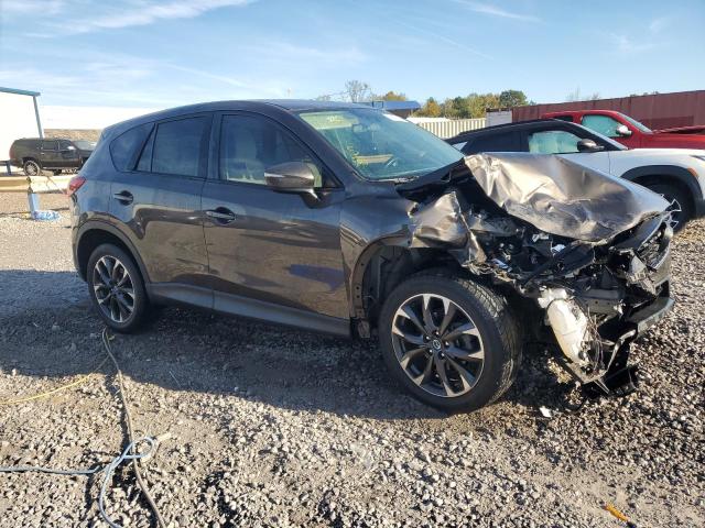 JM3KE2DY8G0767666 - 2016 MAZDA CX-5 GT BROWN photo 4