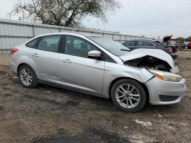 1FADP3F21HL219461 - 2017 FORD FOCUS SE SILVER photo 4