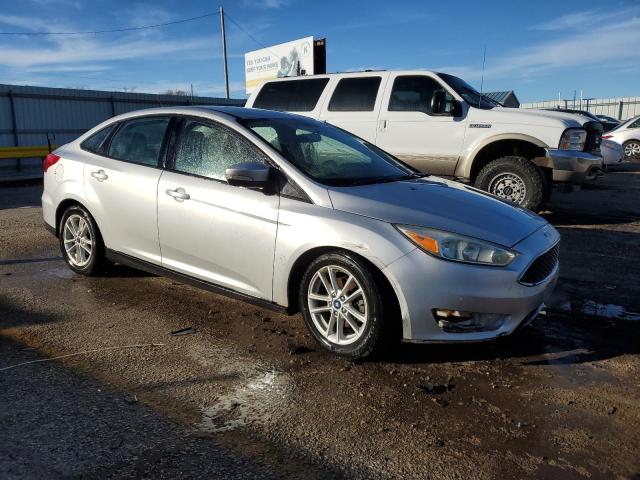 1FADP3F29GL341127 - 2016 FORD FOCUS SE SILVER photo 4