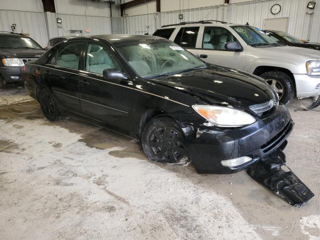 4T1BE32K43U135579 - 2003 TOYOTA CAMRY LE BLACK photo 4