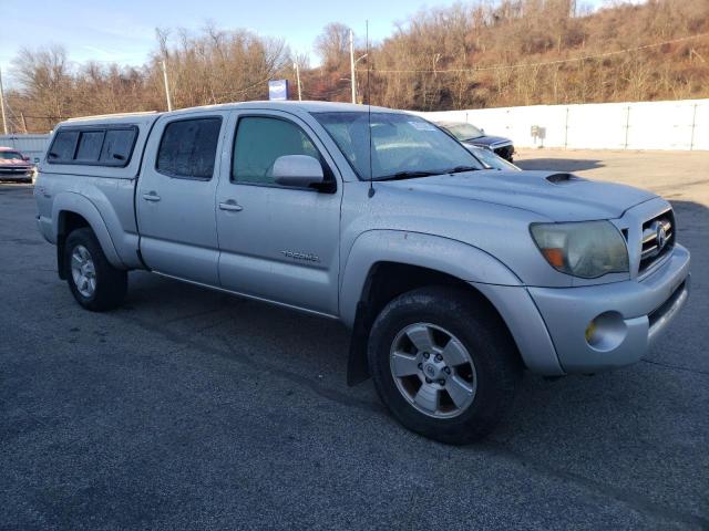 5TEMU52N59Z615538 - 2009 TOYOTA TACOMA DOUBLE CAB LONG BED SILVER photo 4