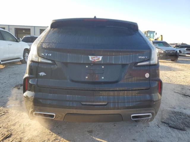 1GYFZER47RF101186 - 2024 CADILLAC XT4 SPORT BLACK photo 6