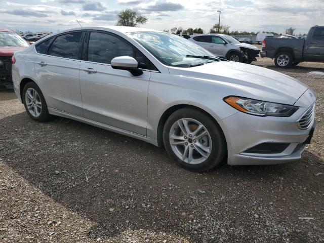 3FA6P0HD9JR224369 - 2018 FORD FUSION SE SILVER photo 4