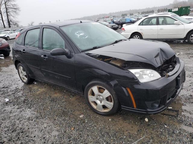 1FAFP37N17W295695 - 2007 FORD FOCUS ZX5 BLACK photo 4