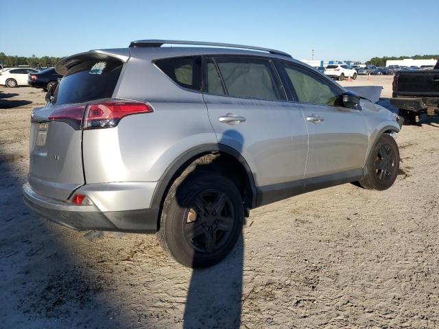 JTMZFREVXJD128657 - 2018 TOYOTA RAV4 LE SILVER photo 3