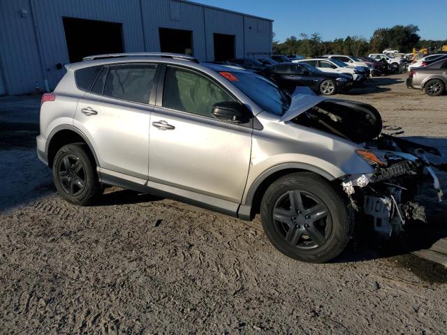 JTMZFREVXJD128657 - 2018 TOYOTA RAV4 LE SILVER photo 4