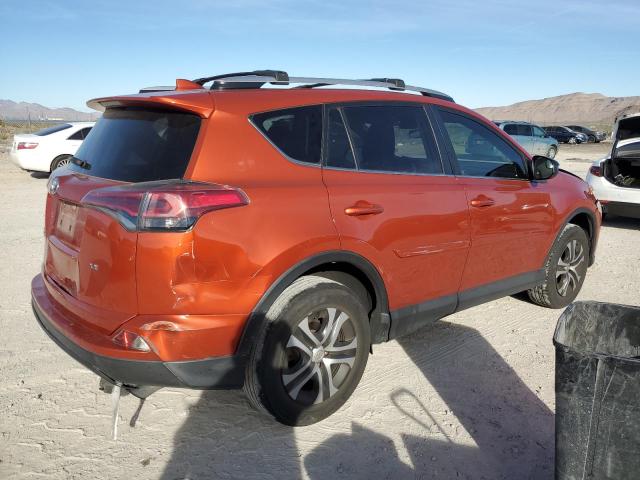 JTMZFREV4GJ071625 - 2016 TOYOTA RAV4 LE ORANGE photo 3