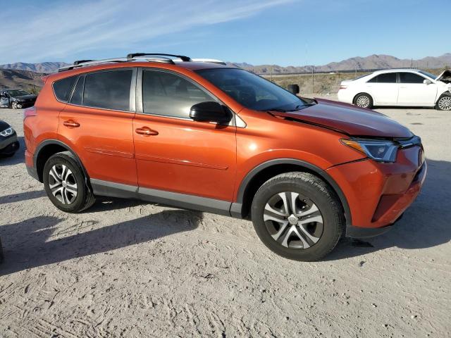 JTMZFREV4GJ071625 - 2016 TOYOTA RAV4 LE ORANGE photo 4