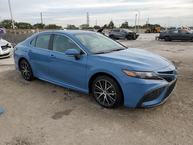 4T1G11AK5PU099334 - 2023 TOYOTA CAMRY SE NIGHT SHADE BLUE photo 4