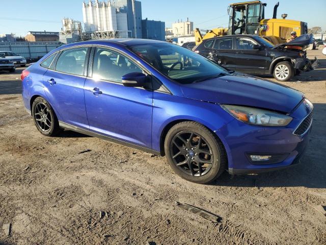 1FADP3F23FL239112 - 2015 FORD FOCUS SE BLUE photo 4