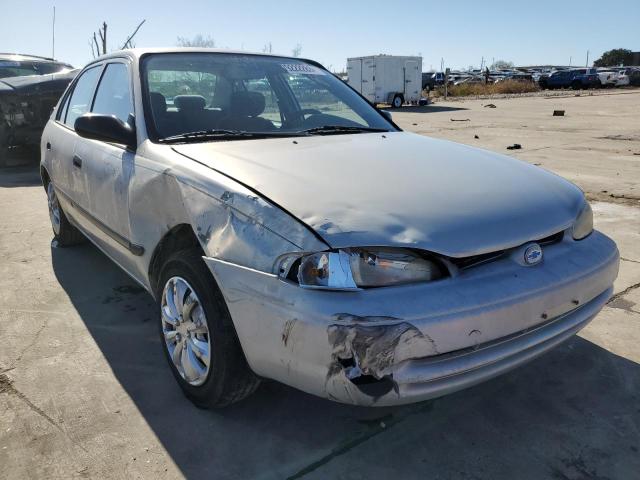 1Y1SK5286YZ427950 - 2000 CHEVROLET GEO PRIZM BASE SILVER photo 4