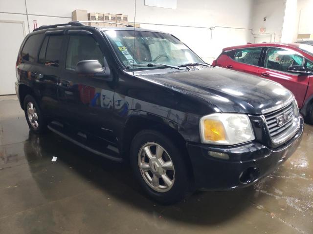 1GKDT13SX32193833 - 2003 GMC ENVOY BLACK photo 4