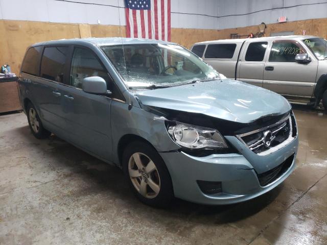 2V8HW34169R543074 - 2009 VOLKSWAGEN ROUTAN SE BLUE photo 4