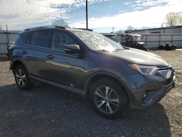 JTMRFREVXHJ129156 - 2017 TOYOTA RAV4 XLE GRAY photo 4