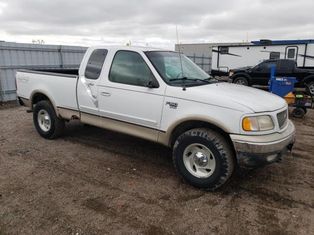 1FTRX18L6YNB73575 - 2000 FORD F150 WHITE photo 4