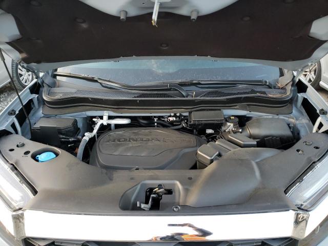 5FNYF8H54PB022496 - 2023 HONDA PASSPORT EXL ლურჯი ფოტო 11