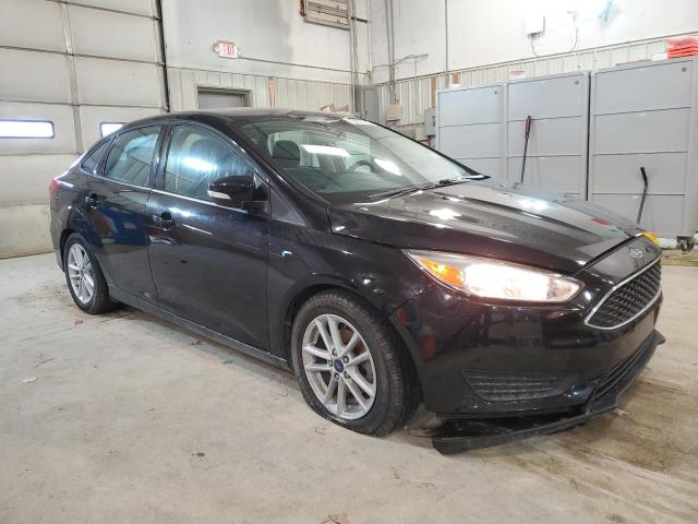 1FADP3F26HL316011 - 2017 FORD FOCUS SE BLACK photo 4