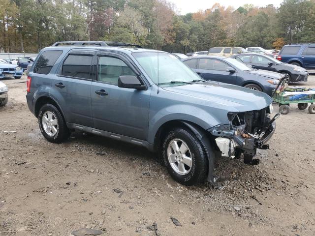 1FMCU0D71BKC29511 - 2011 FORD ESCAPE XLT BLUE photo 4