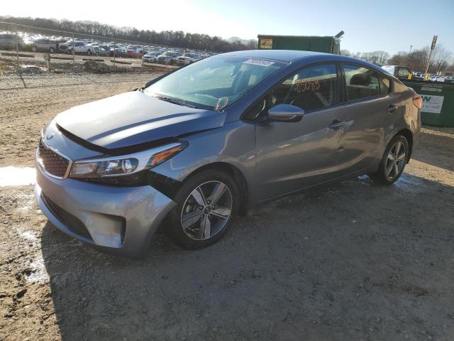 3KPFL4A77JE186830 - 2018 KIA FORTE LX GRAY photo 1