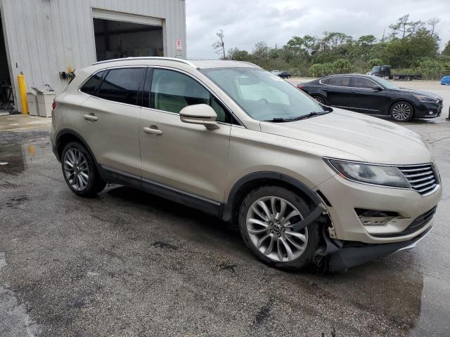 5LMCJ3C91HUL70330 - 2017 LINCOLN MKC RESERVE ოქროსფერი ფოტო 4