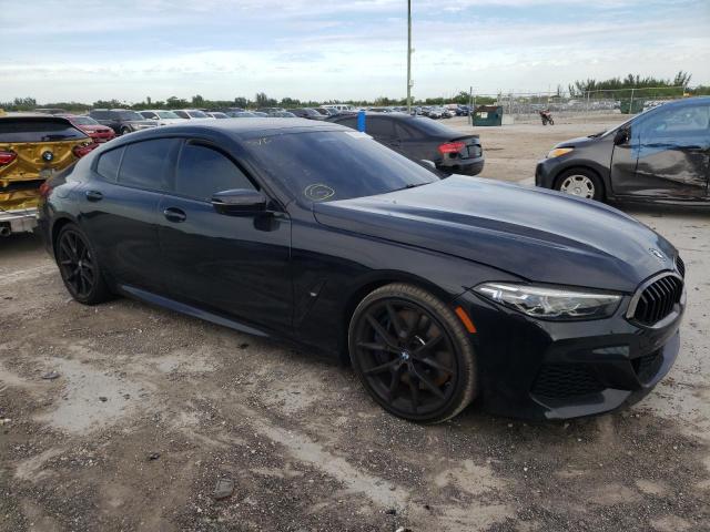 WBAGV8C07MCF63741 - 2021 BMW M850XI BLACK photo 4